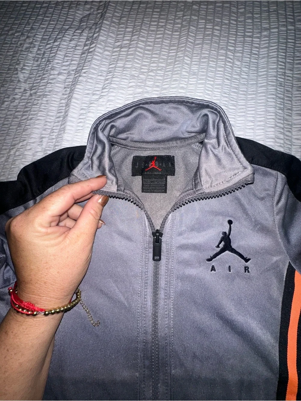 Jordan Gray Track Jacket with Orange Stripes and Black Panels